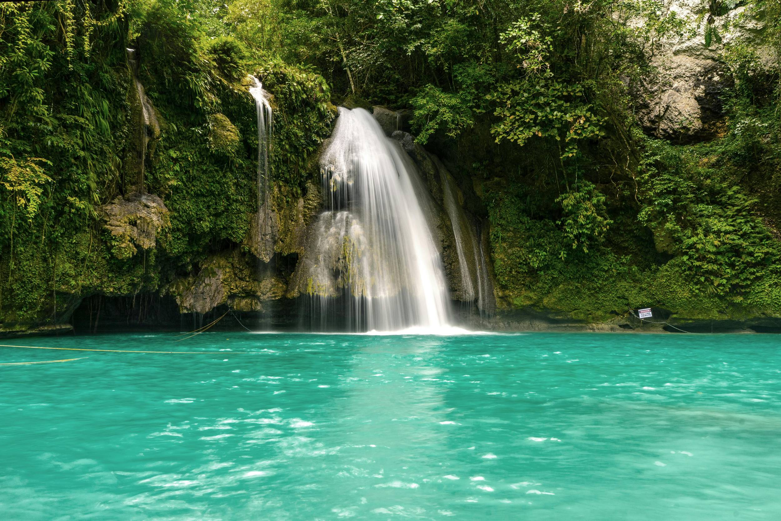 Turquoise water of Kawasan Falls in Cebu