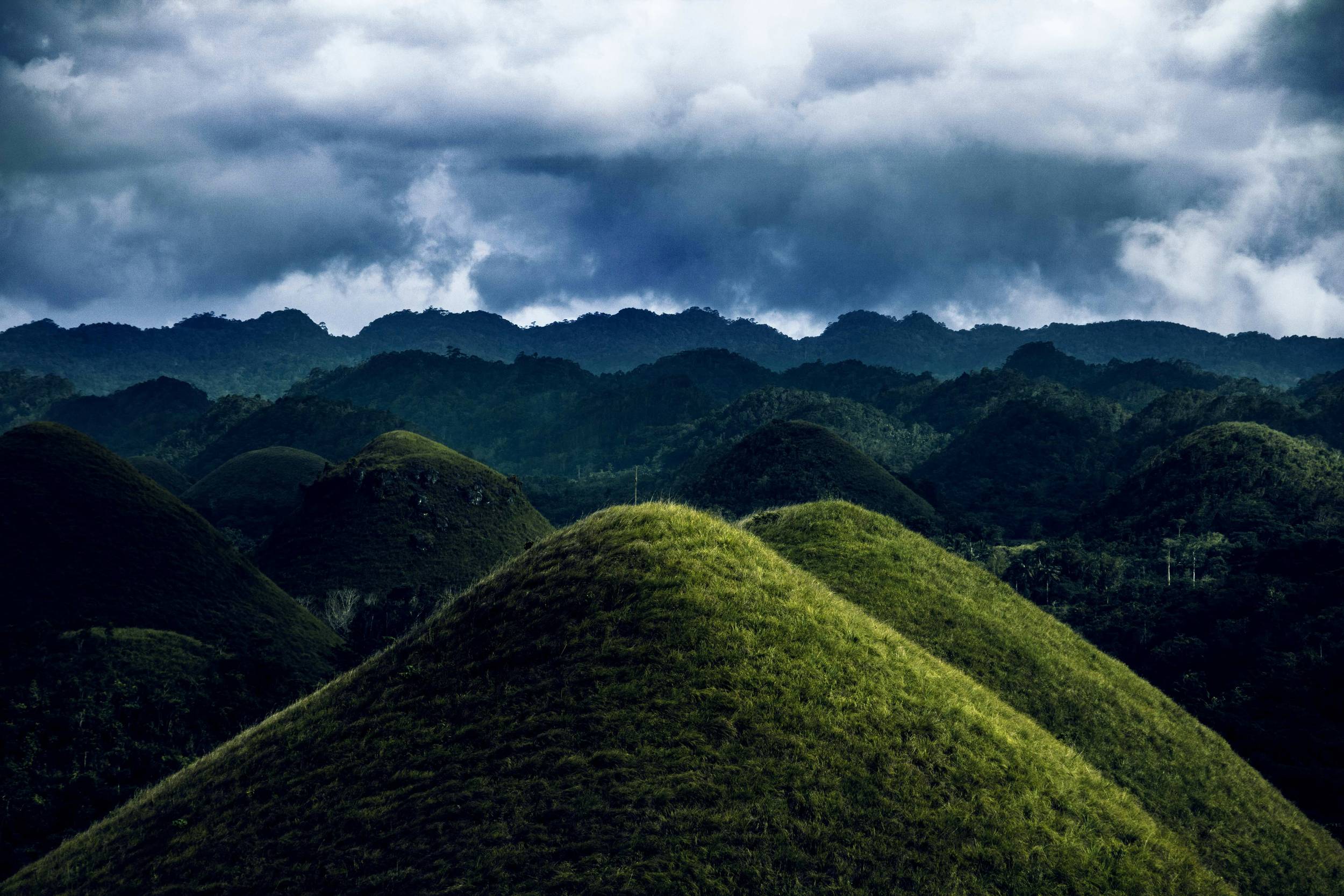 Scenic view of Chocolate Hills in Bohol with lush green landscape